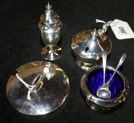 Silver three-piece condiment set, with two spoons and a silver preserve pot cover